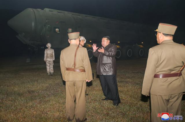 North Korean leader Kim Jong-un stands in front of the ICBM Hwaseong-18 Oct 31 2024 Yonhap