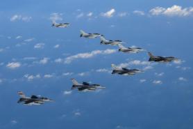 US strategic bomber joins air drills with S.Korea, Japan in response to N.Korean missile test