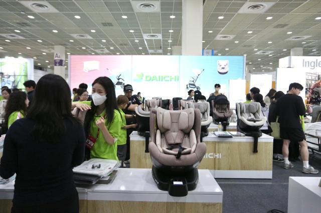 Visitors browse baby products at the Cobe Baby Fair at COEX in Seoul Oct 31 2024 AJP Han Jun-gu