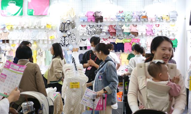 Visitors browse baby products at the Cobe Baby Fair at COEX in Seoul Oct 31 2024 AJP Han Jun-gu