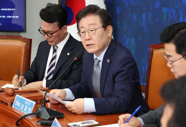 Lee Jae-myung the leader of the Democratic Party of Korea center speaks during a Supreme Council meeting held at the National Assembly in Seoul on Nov 4 Yonhap