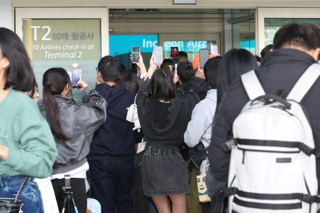 Fans gather as K-pop star G-DRAGON visits Incheon International Airport to attend the CHANEL Cruise 202425 Show on Nov 4 2024 AJP Han Jun-gu