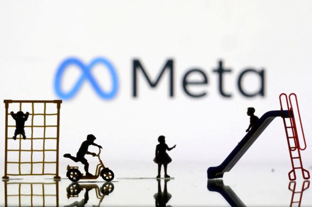 This illustration shows figurines of supposed children playing below the Meta logo Reuters-Yonhap