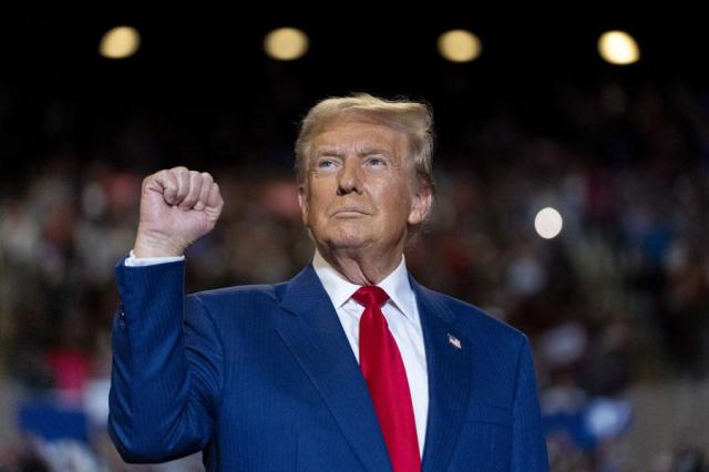 President-elect Donald Trump pumps his fist as he arrives to speak at a campaign event at Nassau Coliseum in Uniondale New York in this file photo in September 2024 AP-Yonhap