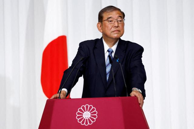 Japanese Prime Minister and leader of the ruling Liberal Democratic Party LDP Shigeru Ishiba speaks during a press conference a day after Japans lower house election at the partys headquarters in Tokyo Oct 28 2024 Reuters-Yonhap