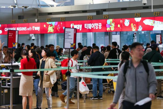 Travelers wait for departure at Incheon International Airport Terminal 1 on Nov 8 2024 AJP Kim Dong-woo