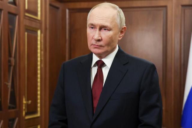 Russias President Vladimir Putin delivers a video address from the Novo-Ogaryovo residence to congratulate officers and veterans of Russias Ministry of Internal Affairs police as Russia celebrates Interior Ministry Presonnel Day TASS-Yonhap