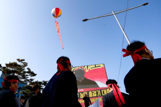 Lawmakers walk at a farmers rally organized by the Korean Succession Advanced Farmers Federation in Seoul on Nov 12 2024 AJP Kim Dong-woo