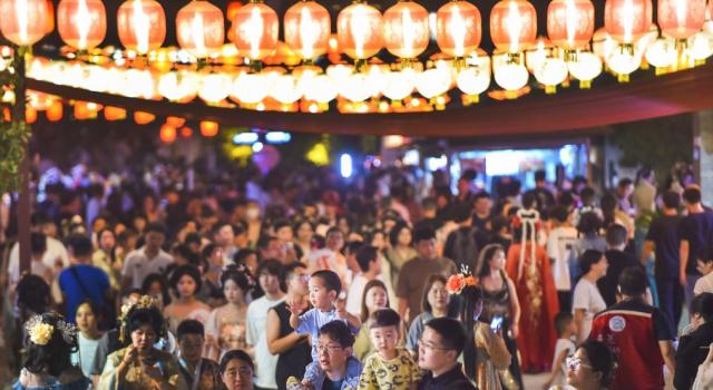 Tourists explore Luoyi Ancient City in Henan Province central China on Sept 16 2024 Xinhua-Yonhap