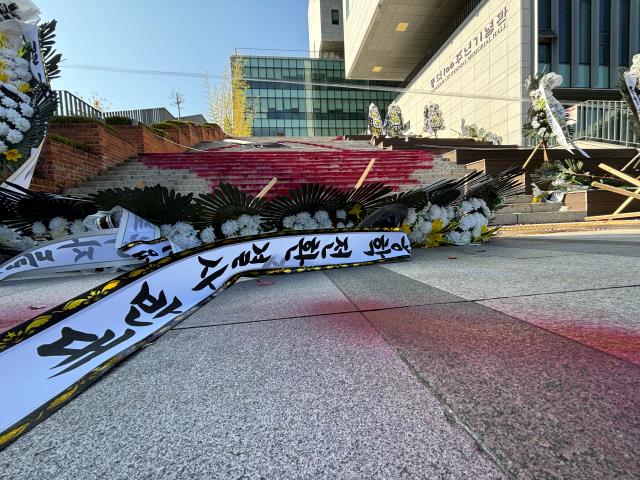 Floral wreaths displaying messages against co-education transition at Dongduk Womens University in Seoul Nov 13 2024 AJP Han Jun-gu