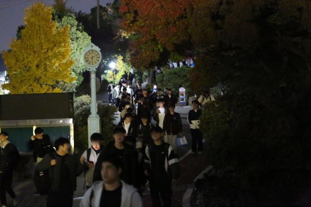 Students leave a test venue after finishing the annual university entrance exam in Seoul on Nov 14 2024 AJP Han Jun-gu