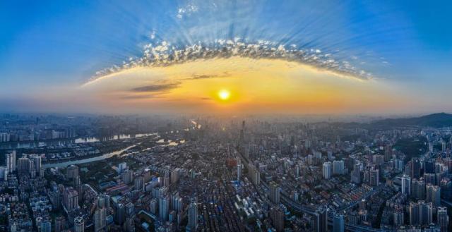 A city view at sunset in Guangzhou south Chinas Guangdong Province is seen in this aerial drone photo taken on March 12 2024 Xinhua-Yonhap