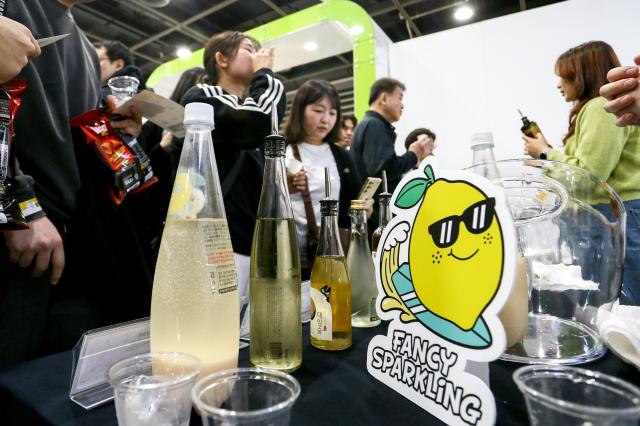 Visitors sample traditional Korean liquors at the Korean Sool Grand Festival 2024 at aT Center in Seoul on Nov 15 2024 AJP Kim Dong-woo