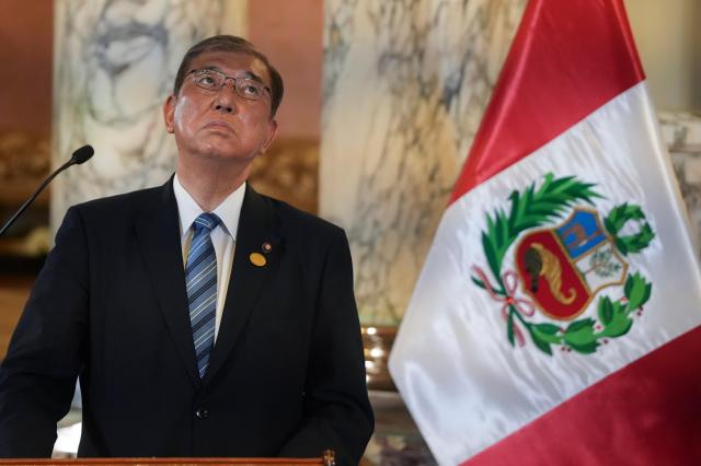 Japans Prime Minister Shigeru Ishiba attends a ceremony at the government palace in Lima Peru Nov 17 2024 AP-Yonhap