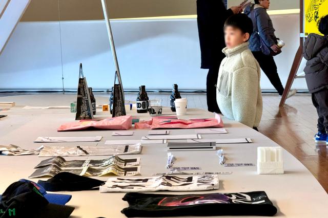 A child looks at the Macao Design Award exhibition at Dongdaemun Design Plaza in Seoul on Nov 18 2024 AJP Kim Dong-woo