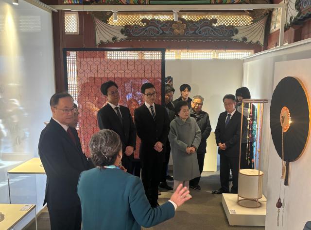 An official explains artworks to VIPs at the opening event of Nexon Foundations exhibition SHAPING TIME IN SEARCH OF ANOTHER WORLD at Deoksugung Palace Nov 18 2024 AJP Han Jun-gu