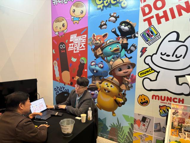 A buyer receives consultations at booths during Content IP Market at COEX in Seoul Nov 19 2024 AJP Han Jun-gu