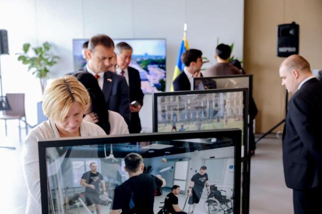 Event participants view a photo display of the Ukrainian war at the War Memorial of Korea in Seoul Korea on Nov 19 2024 Courtesy of Ukrainian Embassy in Seoul