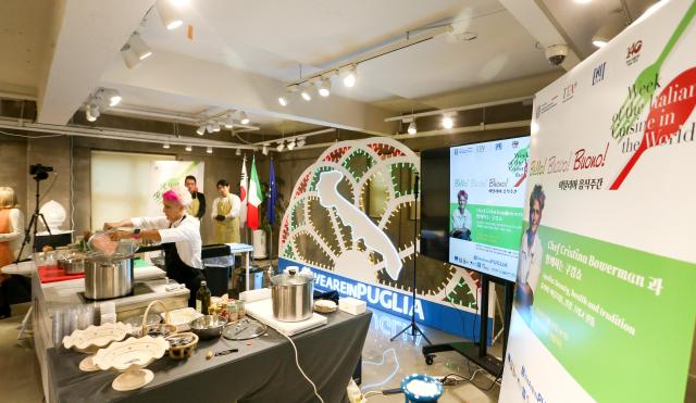 Michelin-starred chef Cristina Bowerman prepares Mediterranean dishes during the Week of Italian Cuisine event in Seoul on Nov 20 2024 AJP Kim Dong-woo