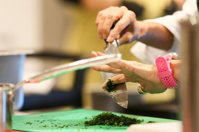 Michelin-starred chef Cristina Bowerman prepares Mediterranean dishes during the Week of Italian Cuisine event in Seoul on Nov 20 2024 AJP Kim Dong-woo