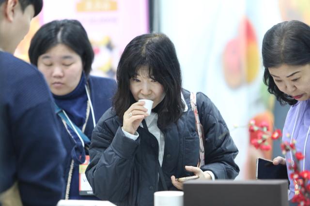 Visitors taste food samples at the Food Week event at COEX in Seoul Nov 20 2024 AJP Han Jun-gu