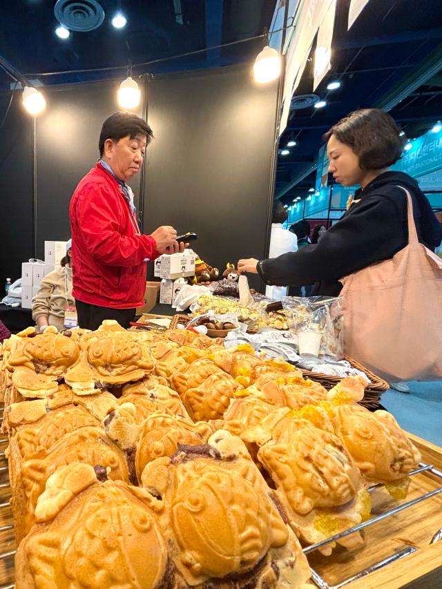 A visitor explores booths at the Food Week event at COEX in Seoul Nov 20 2024 AJP Han Jun-gu