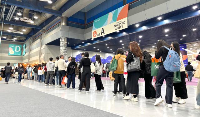 Visitors line up to experience booth activities at the Food Week event at COEX in Seoul Nov 20 2024 AJP Han Jun-gu