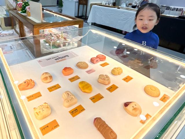 A child explores booths at the Food Week event at COEX in Seoul Nov 20 2024 AJP Han Jun-gu