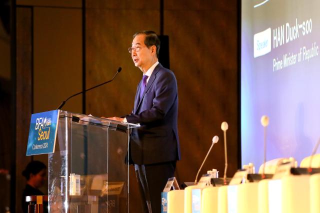 Prime Minister Han Duck-soo delivers remarks during the Boao Forum for Asia Seoul Conference at Four Seasons Hotel in Seoul on Nov 22 2024 AJP Kim Dong-woo