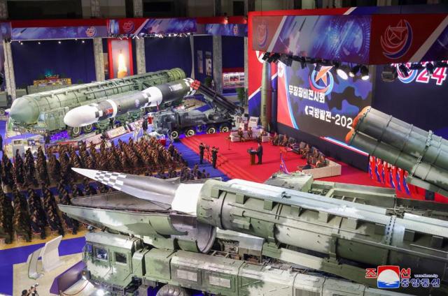 Missiles and other weapons are displayed at an exhibition in Pyongyang on Nov 21 2024 in this photo released by the North Korean Central News Agency the following day 