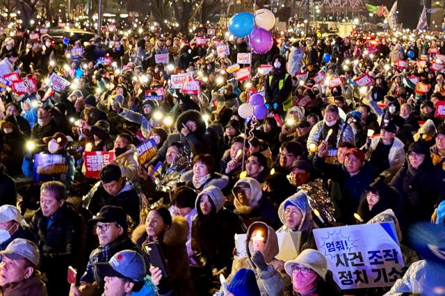 A view shows protesters gathering near Gwanghwamun Square during a rally in Seoul on Nov 30 2024 AJP Kim Dong-woo