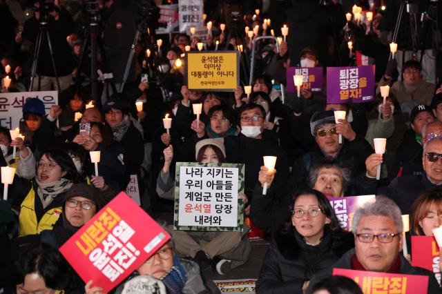 Citizens gather to demand the resignation and arrest of President Yoon Suk Yeol near Gwanghwamun Station in Seoul on Dec 4 2024 AJP Han Jun-gu