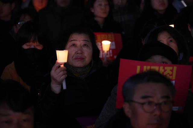 Citizens gather to demand the resignation and arrest of President Yoon Suk Yeol near Gwanghwamun Station in Seoul on Dec 4 2024 AJP Han Jun-gu