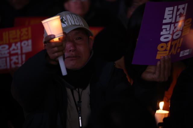 Citizens gather to demand the resignation and arrest of President Yoon Suk Yeol near Gwanghwamun Station in Seoul on Dec 4 2024 AJP Han Jun-gu