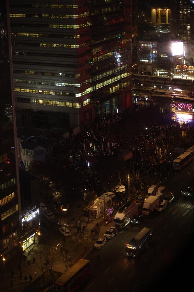 Citizens gather to demand the resignation and arrest of President Yoon Suk Yeol near Gwanghwamun Station in Seoul on Dec 4 2024 AJP Han Jun-gu