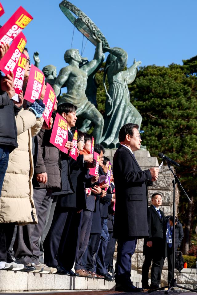 The main opposition Democratic Party leader Lee Jae-myung speaks during a press conference at the National Assembly in Seoul on Dec 6 2024 AJP Kim Dong-woo