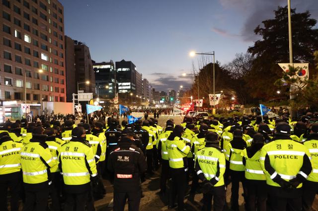 Police control protesters entry to the National Assembly building in Yeouido Seoul on Dec 7 2024 AJP Han Jun-gu