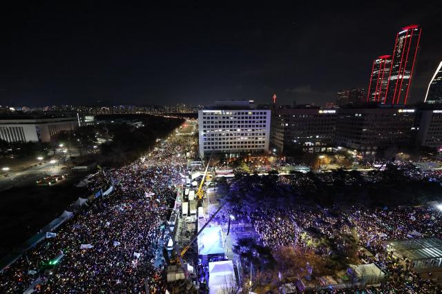 Citizens gathers near the National Assembly in Yeouido Seoul calling for President Yoons impeachment on Dec 7 2024 AJP Han Jun-gu
