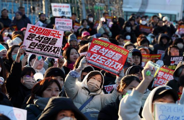 Citizens of Gwangju participate in a protest calling for the president’s arrest in Gwangju Korea on Dec 8 2024