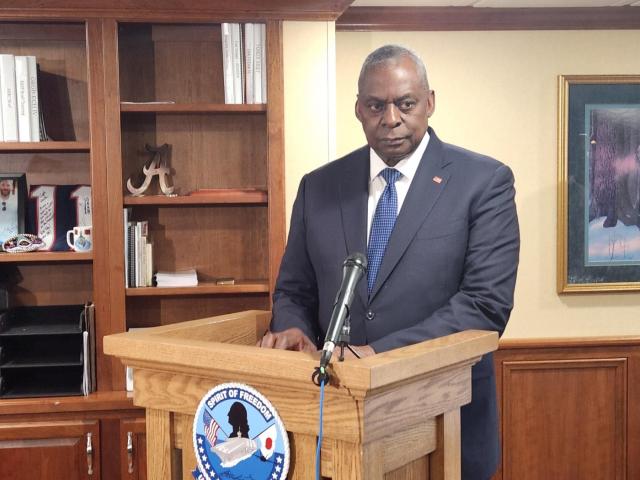 US Defense Secretary Lloyd Austin speaks to reporters aboard the USS George Washington nuclear-powered aircraft carrier at Yokosuka Naval Base near Tokyo on Dec 9 2024 Yonhap