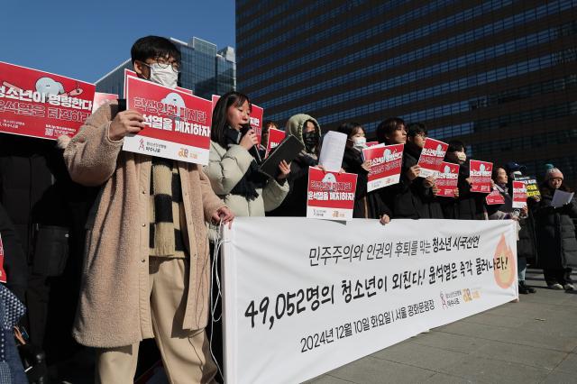 Youth organizations including Asunaro hold a press conference urging President Yoon Suk Yeols resignation at Gwanghwamun Plaza in Seoul on Dec 10 2024 AJP Han Jun-gu