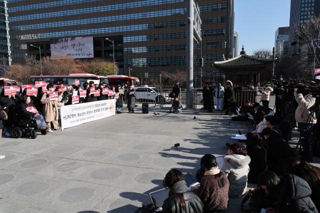 Youth organizations including Asunaro hold a press conference urging President Yoon Suk Yeols resignation at Gwanghwamun Plaza in Seoul on Dec 10 2024 AJP Han Jun-gu