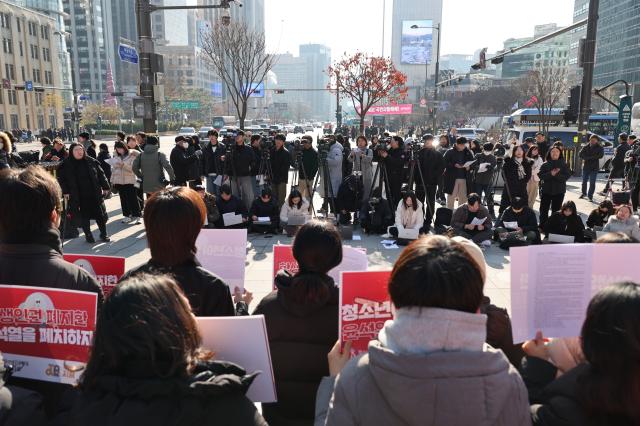 Youth organizations including Asunaro hold a press conference urging President Yoon Suk Yeols resignation at Gwanghwamun Plaza in Seoul on Dec 10 2024 AJP Han Jun-gu