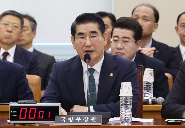 Former defense minister Kim Yong-hyun answers questions from lawmakers during the National Assembly Defense Committees plenary session held on Nov 28 Yonhap