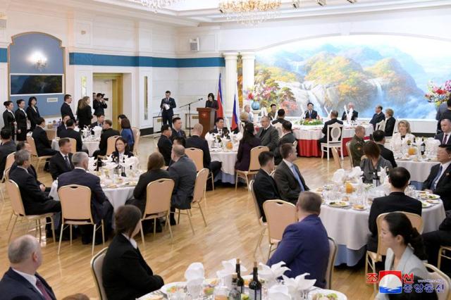 Guests attend a banquet in Pyongyang on Dec 10 2024 in this photo released by the Norths state-run Korea Central News Agency the following day