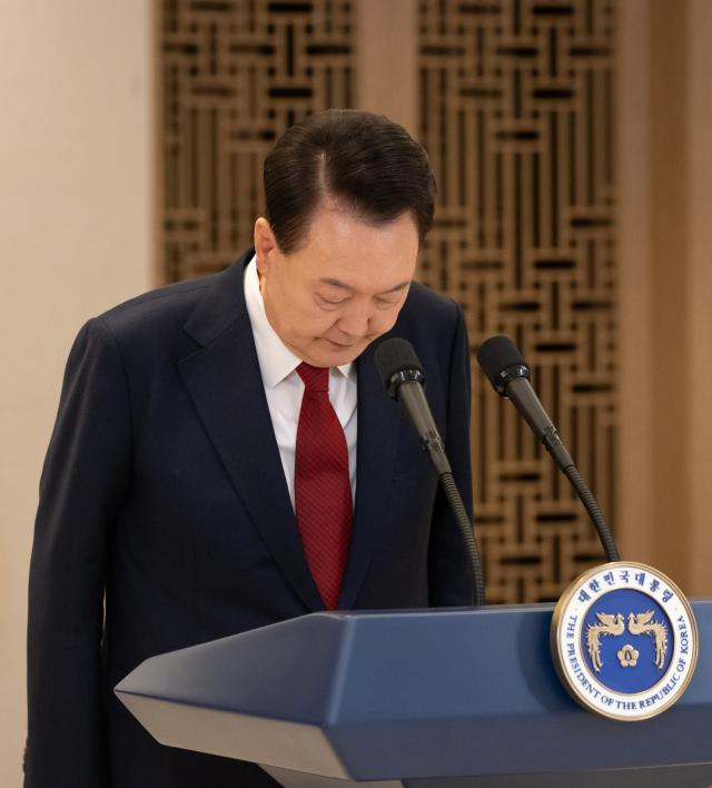 President Yoon Suk Yeol bows his head for greetings at the presidential office in Yongsan, Seoul on Dec. 12, 2024. Yonhap