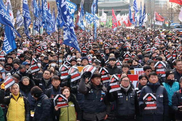Members of the Korean Confederation of Trade Unions shout for the impeachment of President Yoon Suk Yeol near City Hall Station in Seoul Dec 12 2024 AJP Han Jun-gu