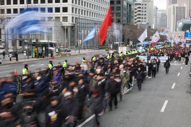 Members of the Korean Confederation of Trade Unions march from City Hall Station to the Presidential Office in Yongsan in Seoul Dec 12 2024 AJP Han Jun-gu