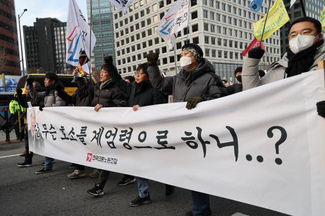 Members of the Korean Confederation of Trade Unions march from City Hall Station to the Presidential Office in Yongsan in Seoul Dec 12 2024 AJP Han Jun-gu