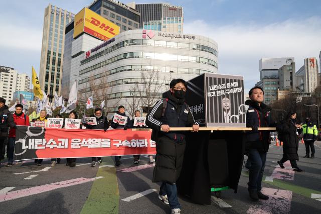 Members of the Korean Confederation of Trade Unions march from City Hall Station to the Presidential Office in Yongsan in Seoul Dec 12 2024 AJP Han Jun-gu